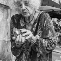 Woman with a young pigeon